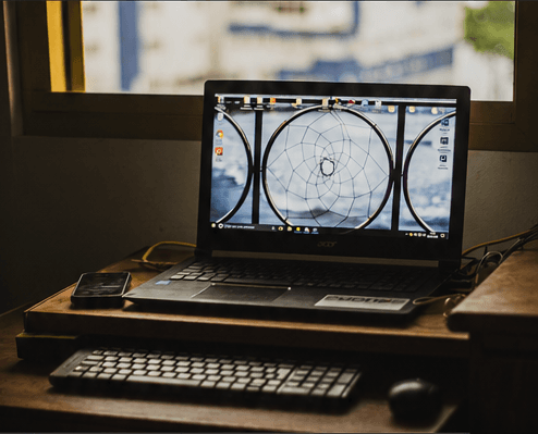 Laptop displaying the iDeal Wealth and Fund Management platform